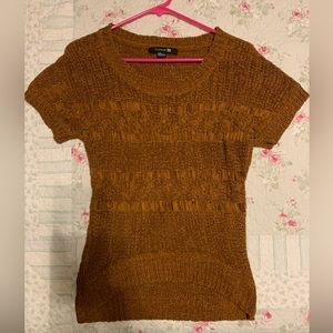 Rust orange brown short sleeve sweater.